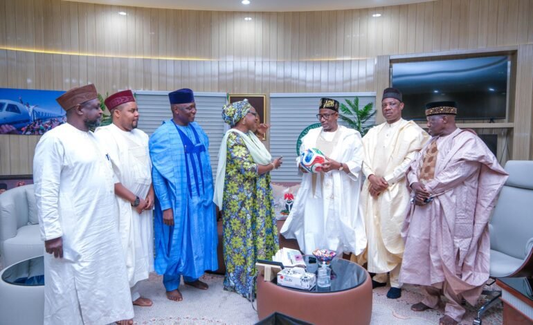 Bala Mohammed Receives Signed World Cup Ball From Canadian Player